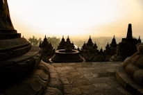 A serene photo of a Buddhist temple at sunrise in Myanmar, reflecting peaceful spirituality.