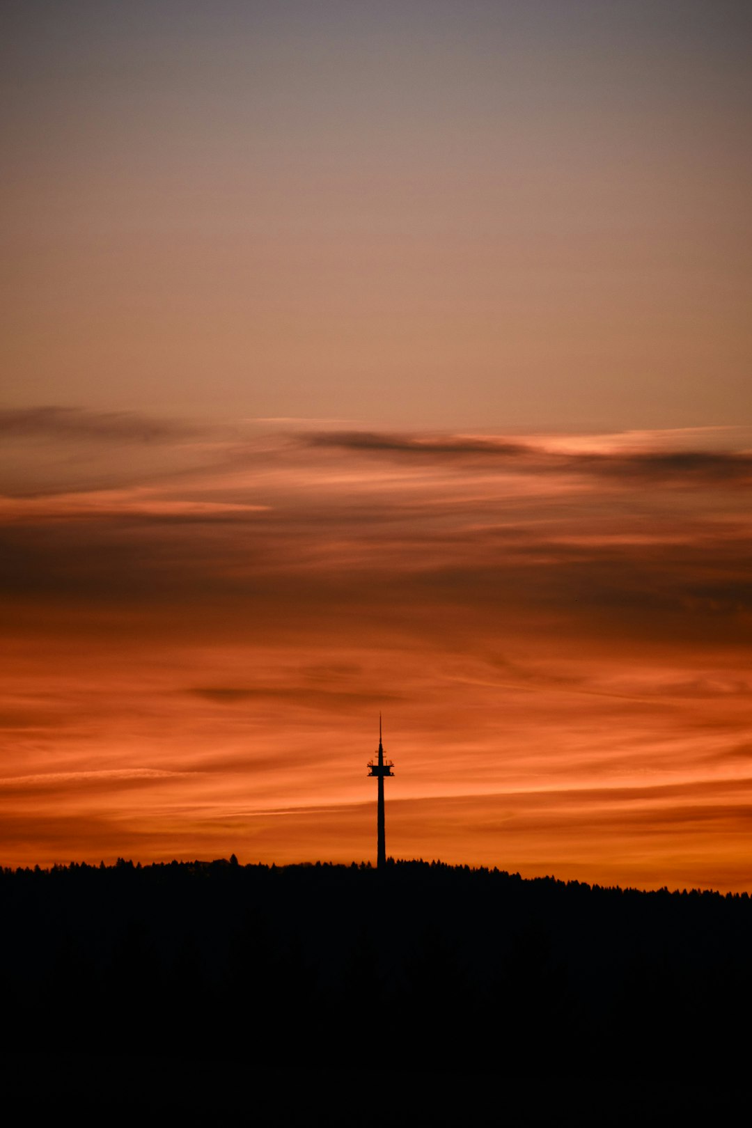 silhouette of tower during sunset