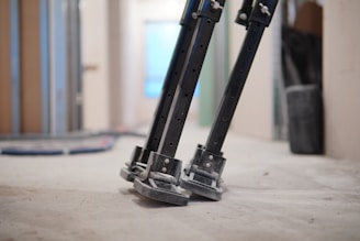 black metal stand on white floor