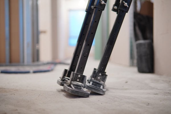 black metal stand on white floor