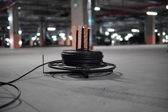 black cupcake on black round plate
