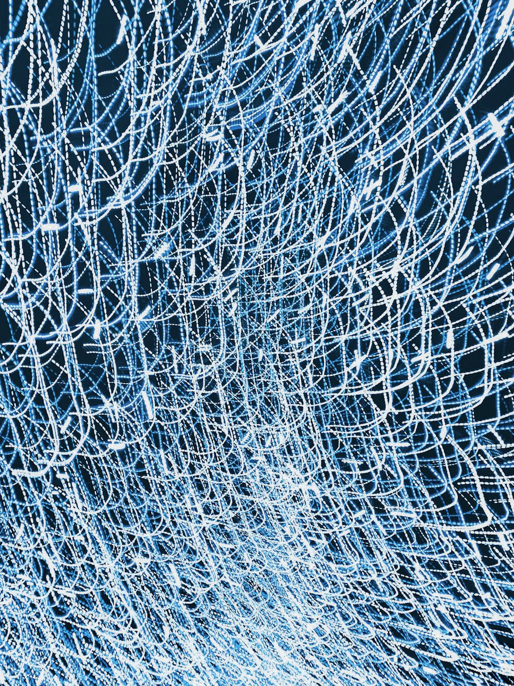 white and blue net in close up photography