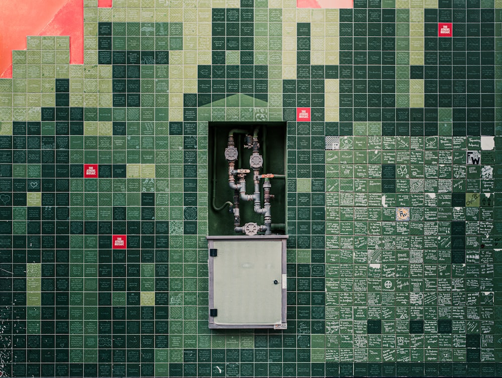 green and white brick wall