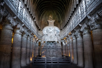 gray concrete building with statues