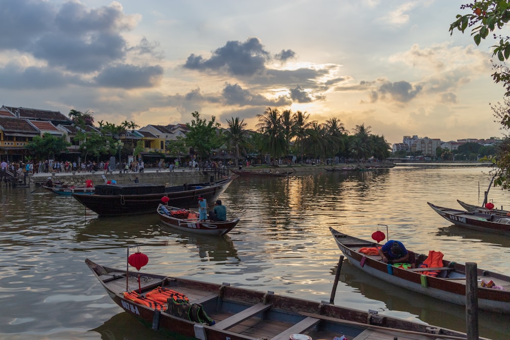 people riding on boat on water during daytime