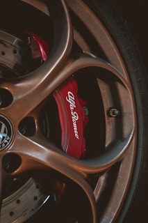 black and red car wheel