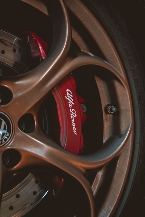 black and red car wheel