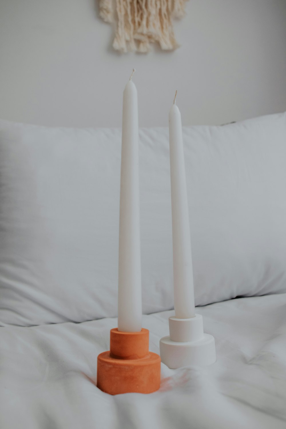 white and orange candle stick