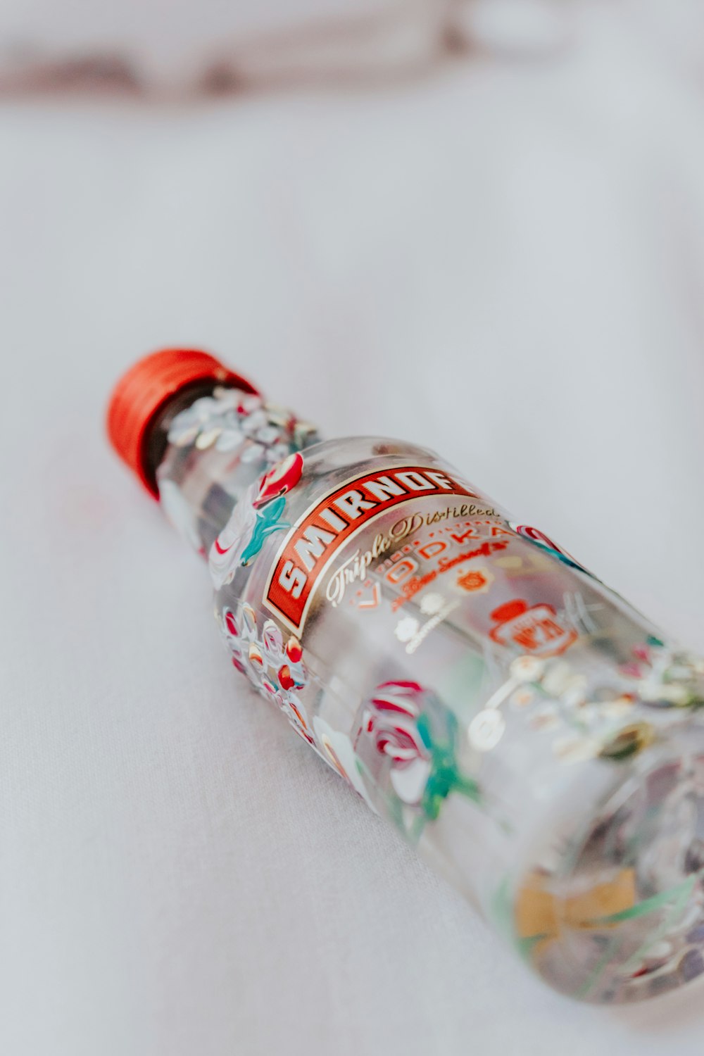 clear plastic bottle on white table