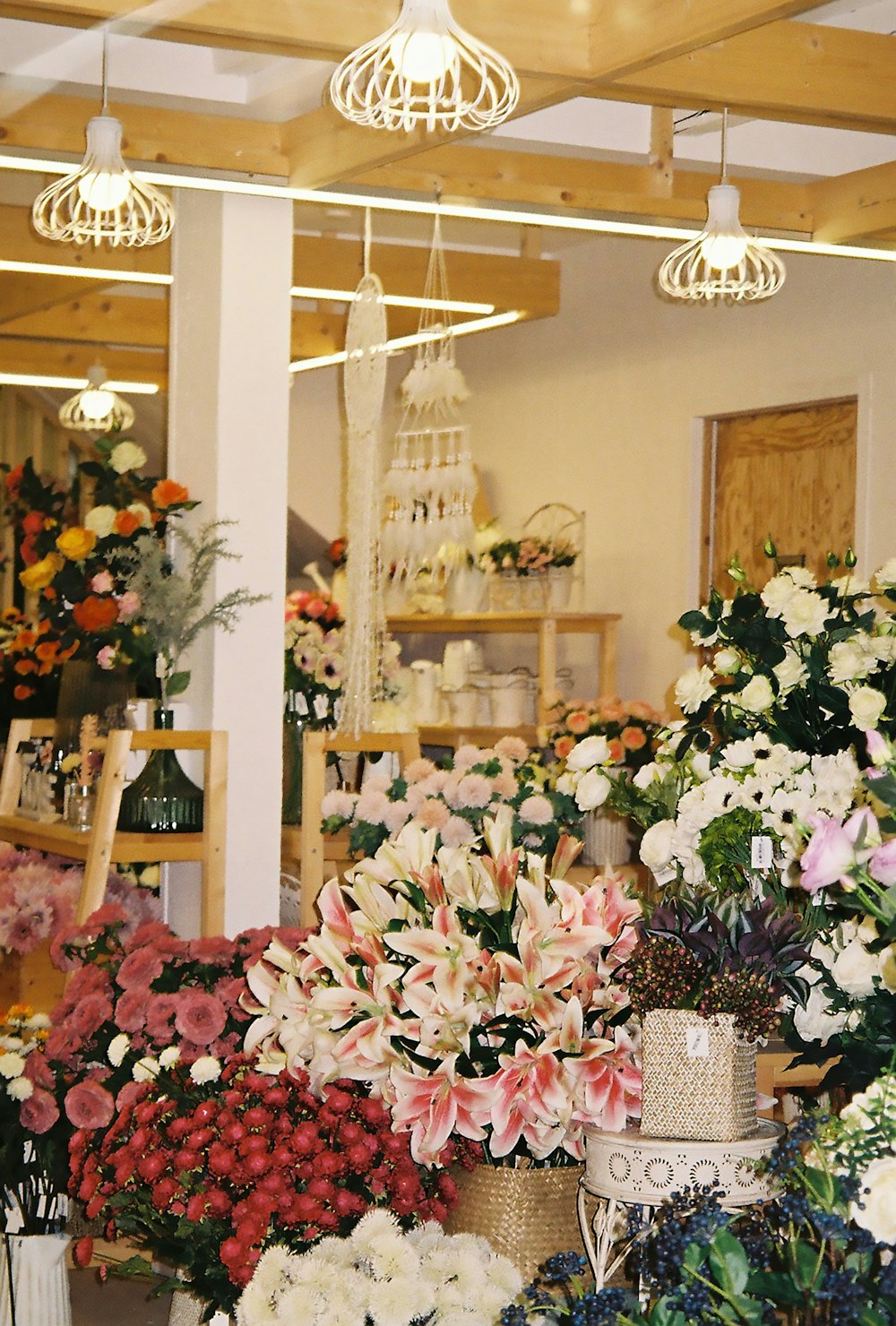 white and pink flowers on table