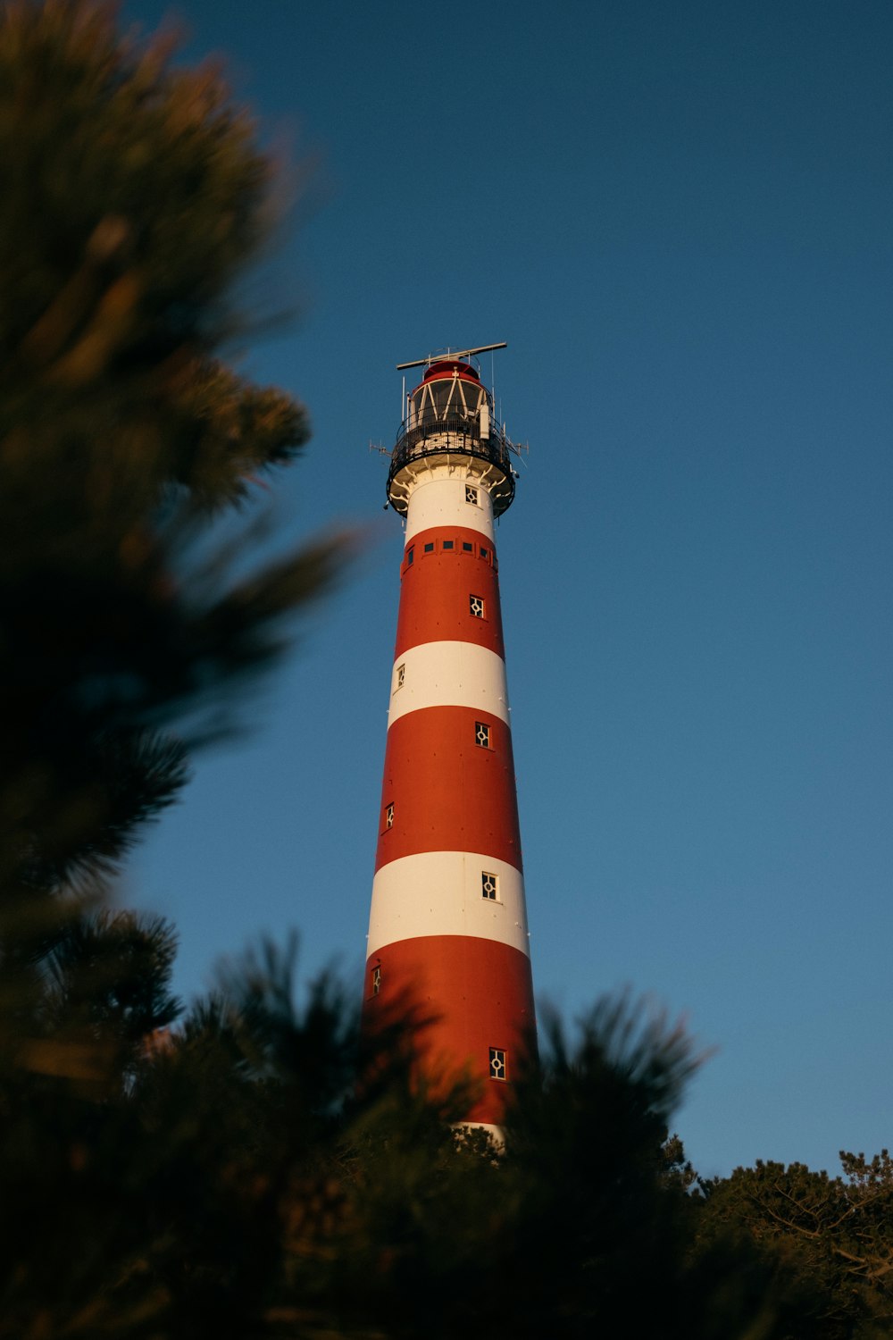 orange and white light house