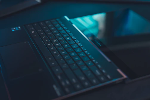 black and blue laptop computer