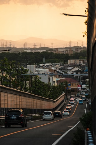 An open road with various cars driving in the distance.