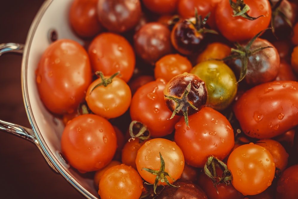 red and green bell peppers on blue ceramic bowl