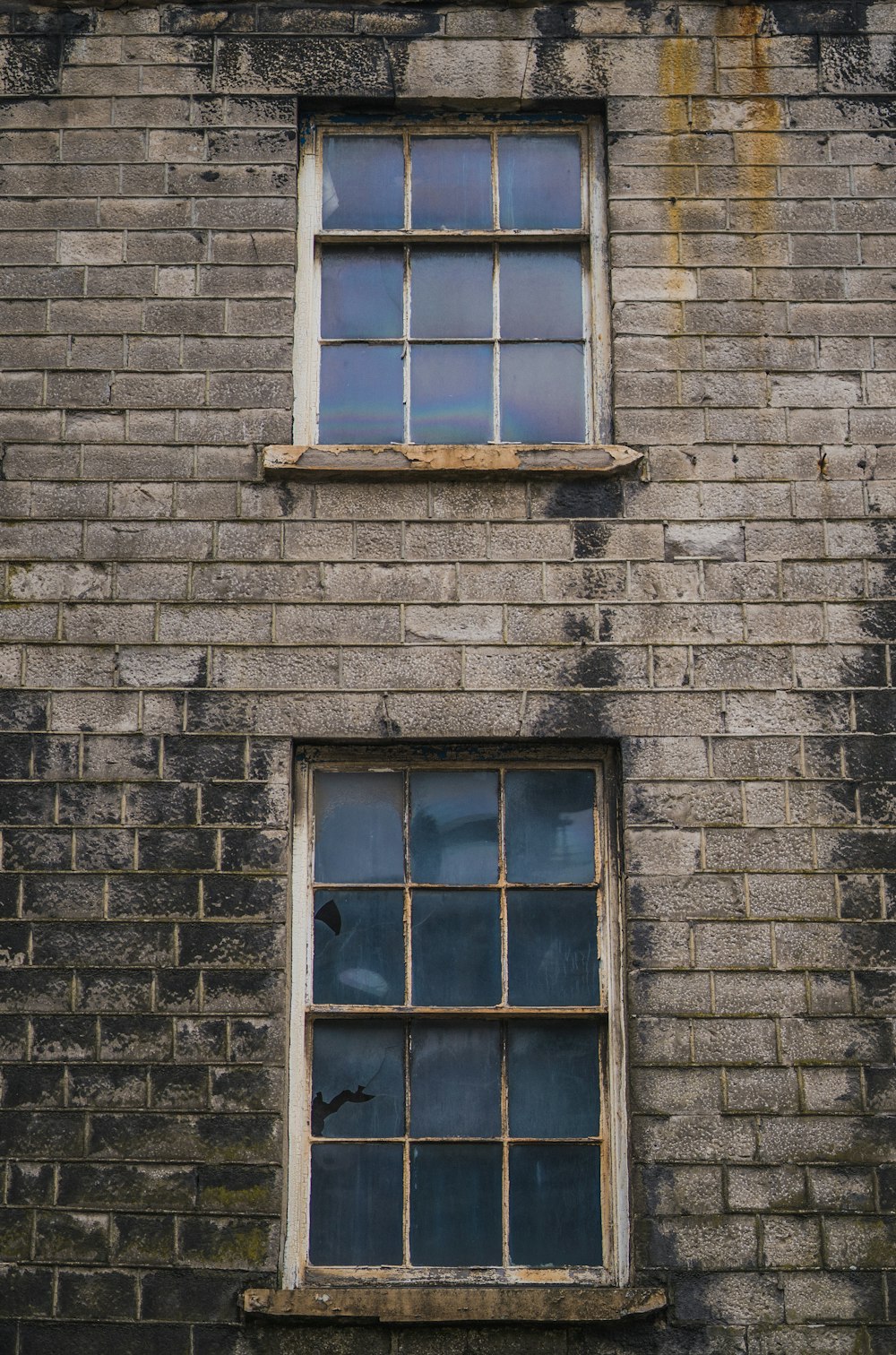 brown wooden framed glass window