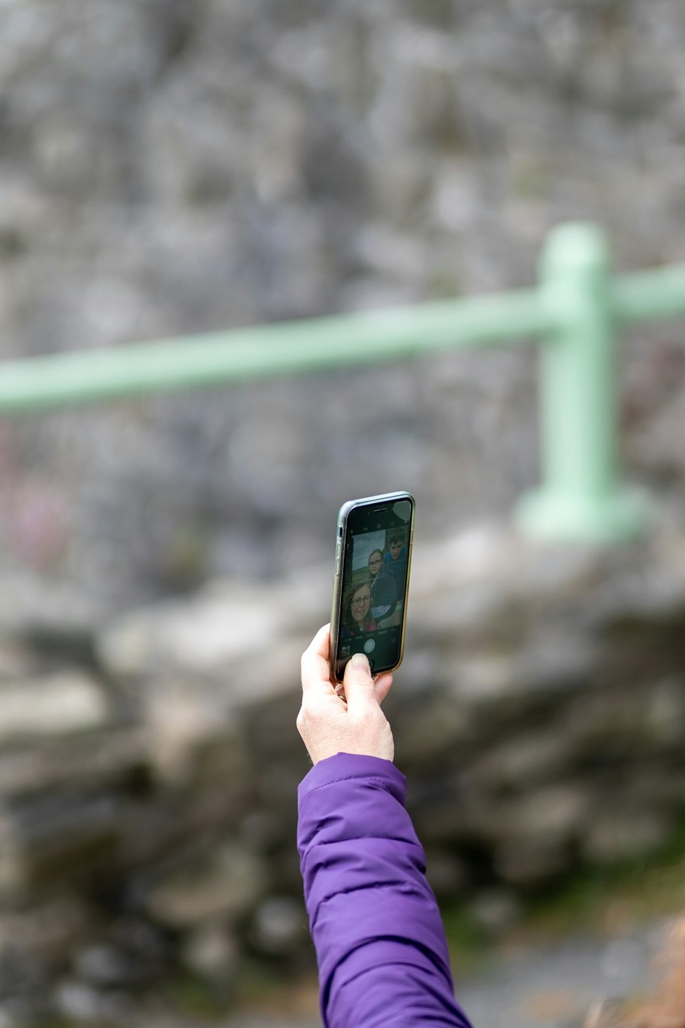 person holding black smartphone during daytime