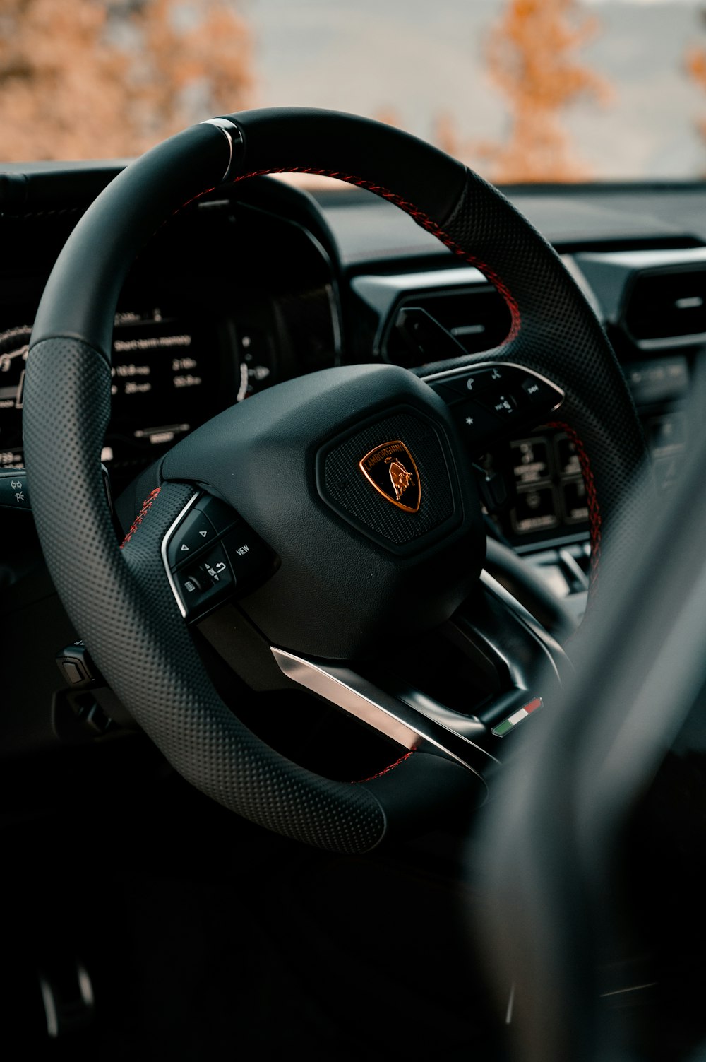 black and red steering wheel