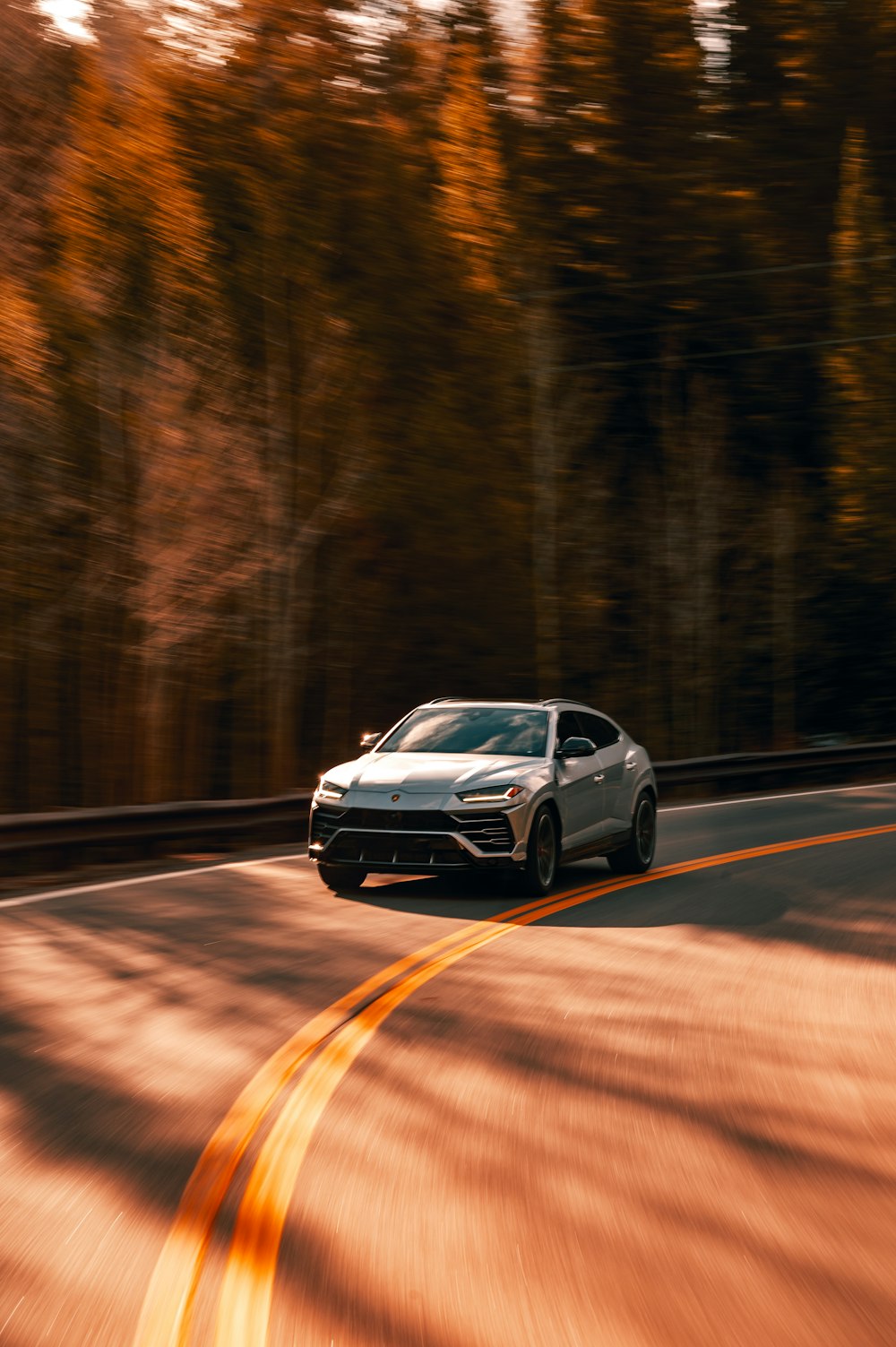 black sedan on road during daytime