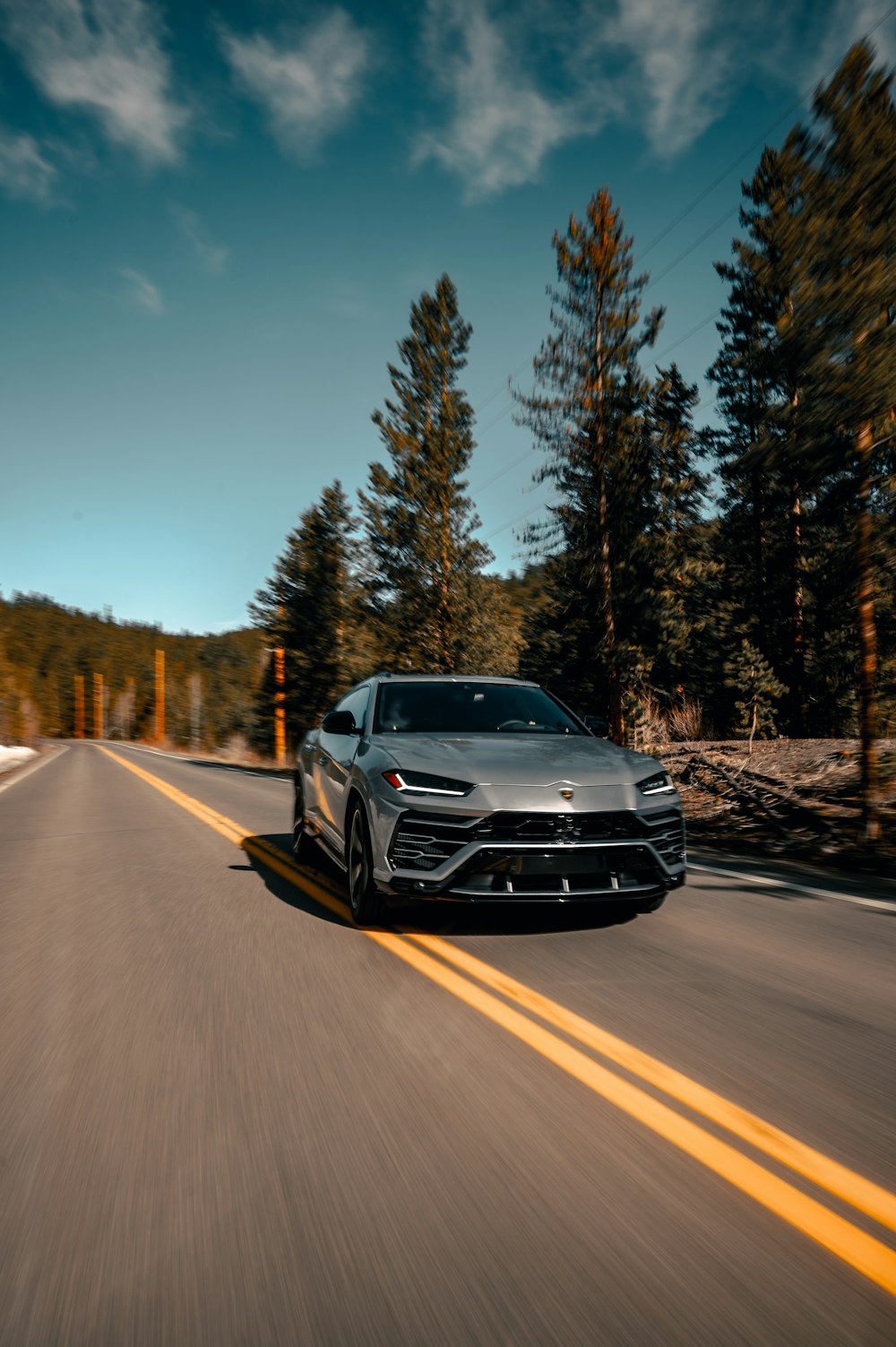 black car on road during daytime