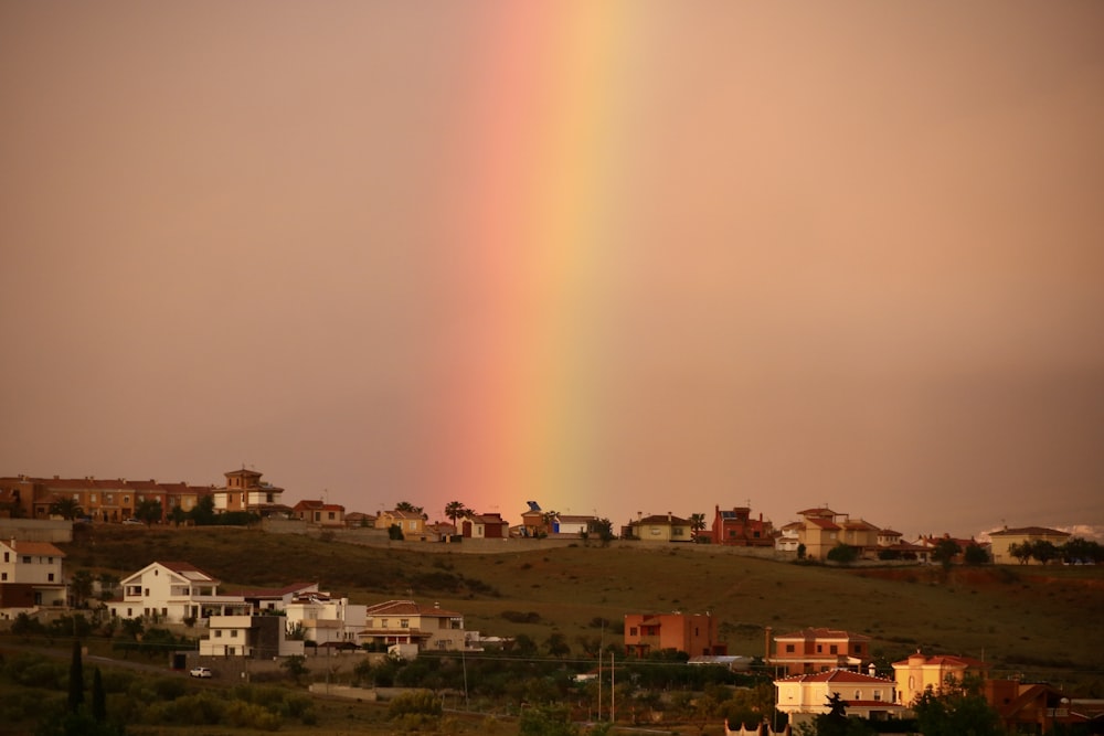 white and brown houses under white sky during daytime