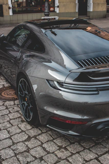 A shiny vehicle freshly painted in metallic gray, reflecting the Çiğli sun.