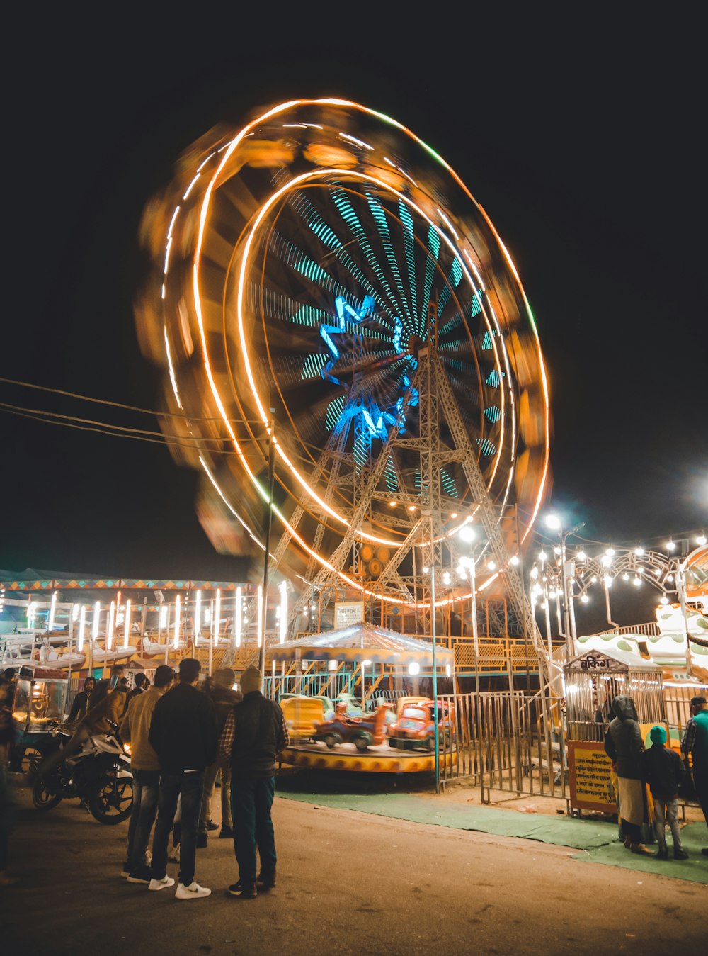 people walking on park during night time