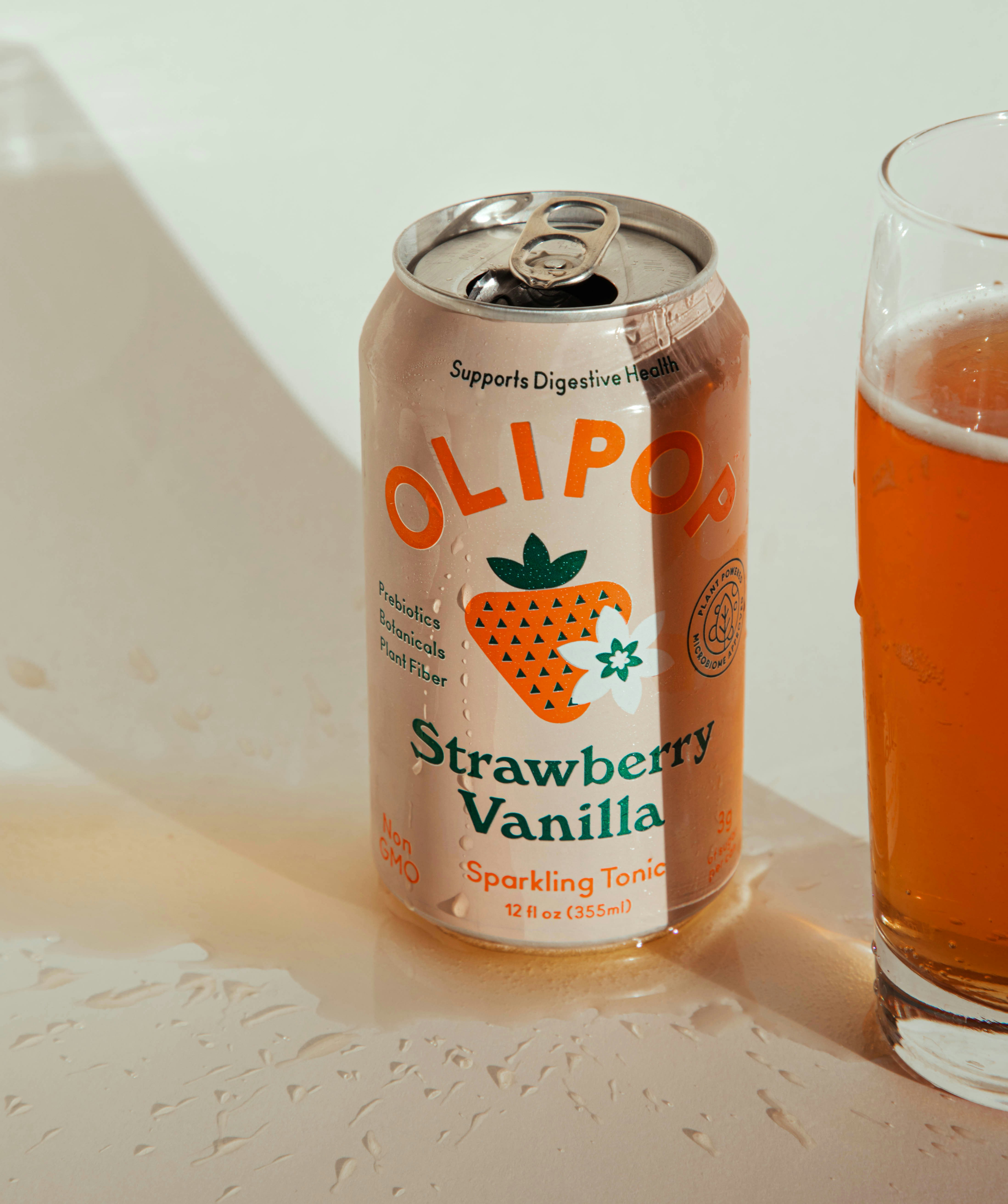 clear drinking glass with orange liquid