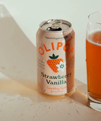 Healthy beverage choices featuring Poppi sparkling drinks, protein shakes, and bottled water.