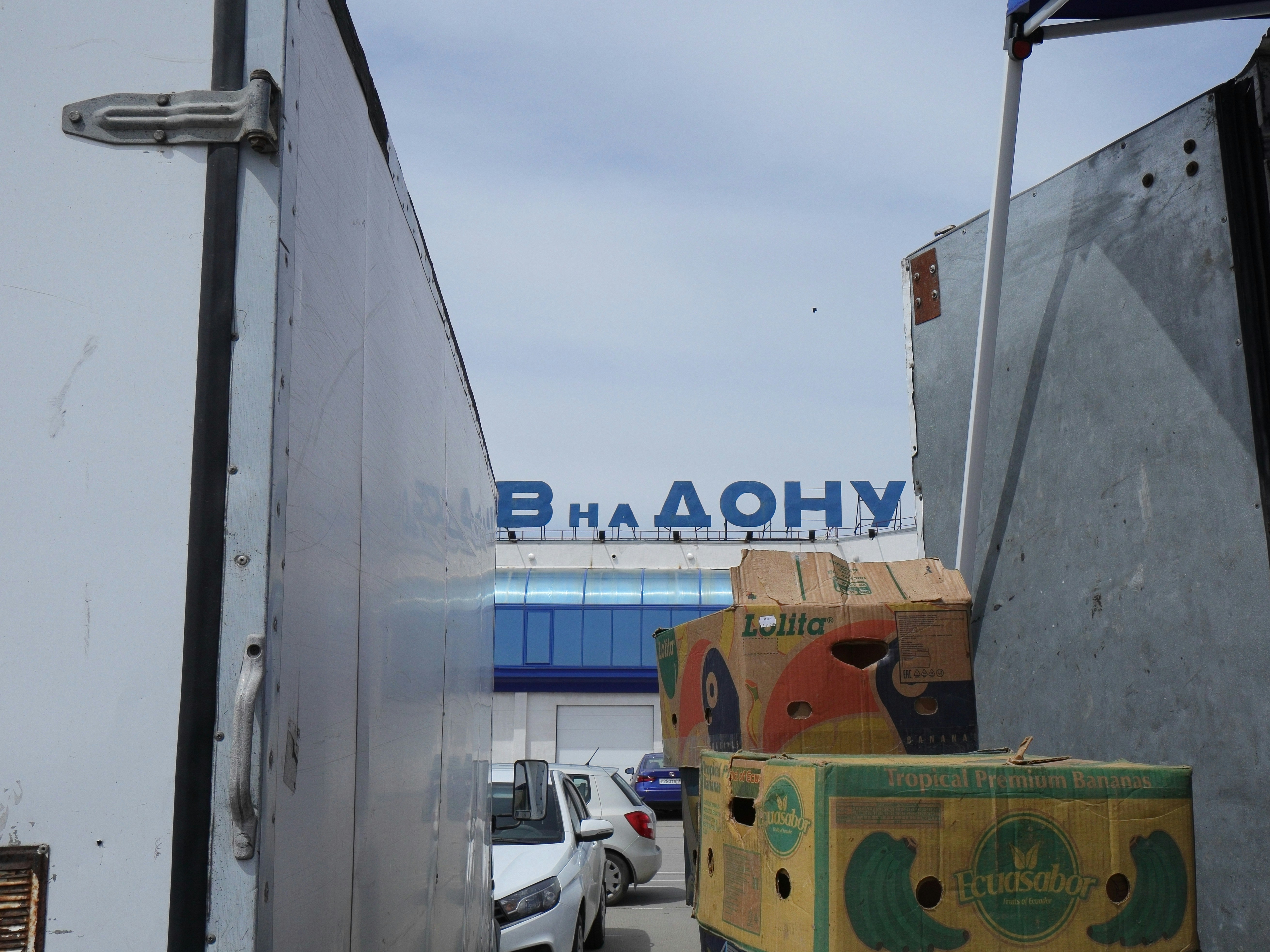 white and black cars on road during daytime