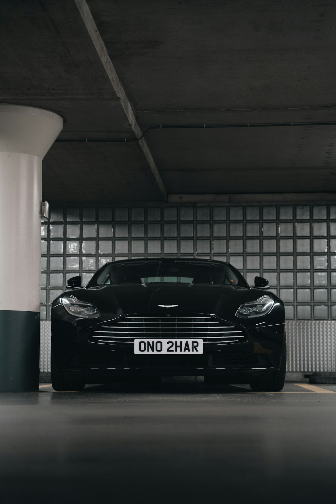 black porsche 911 parked in garage