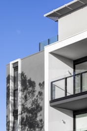 white concrete building under blue sky during daytime