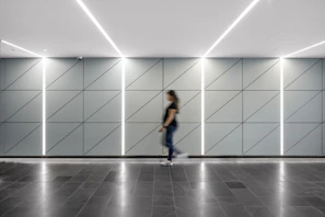Stylish hallway with dark wood-look porcelain tiles installed effortlessly.
