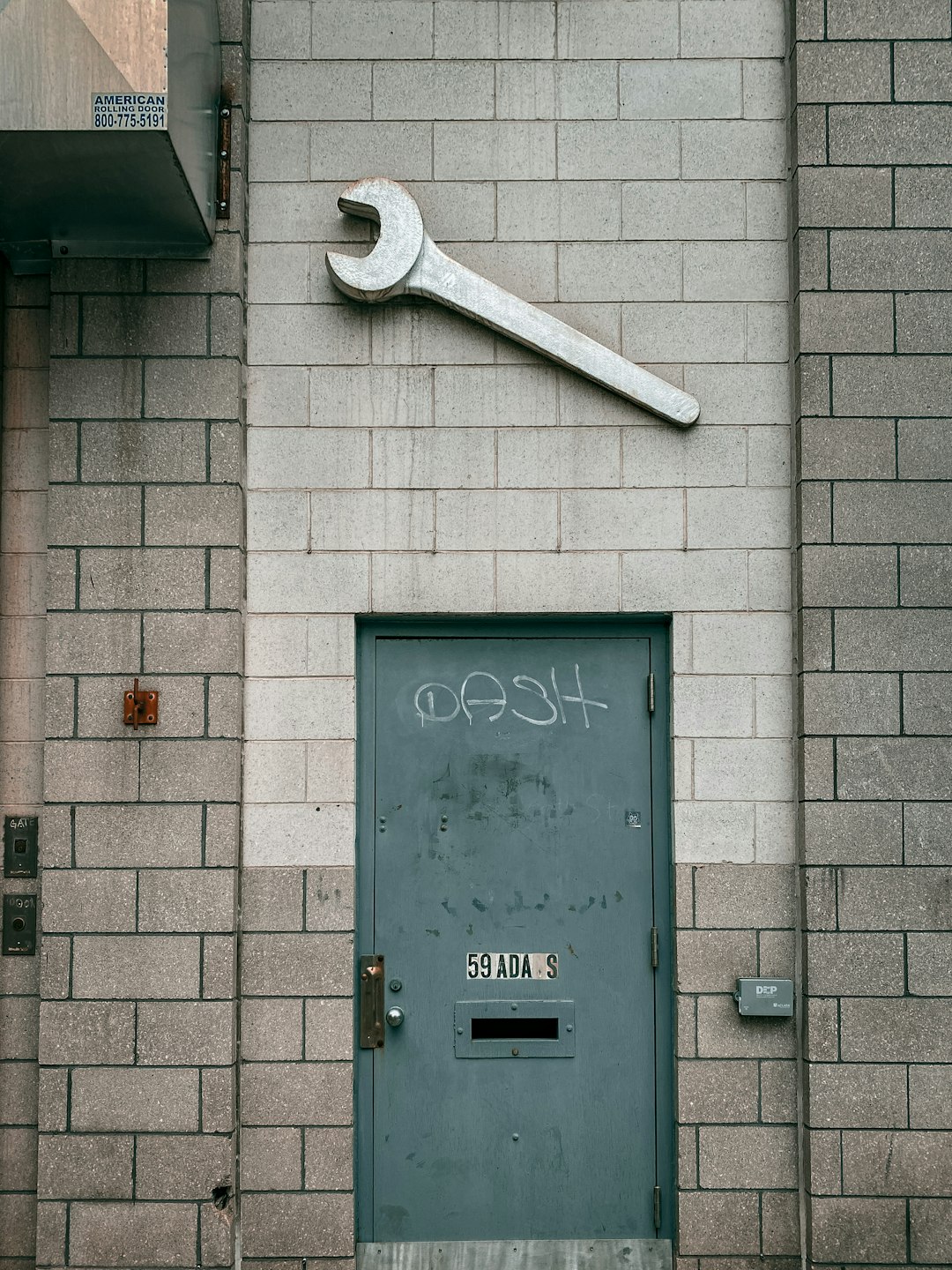 gray steel door with number 8