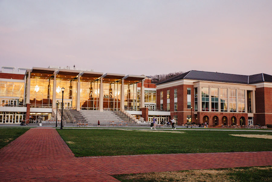 Student walking near campus at sunset