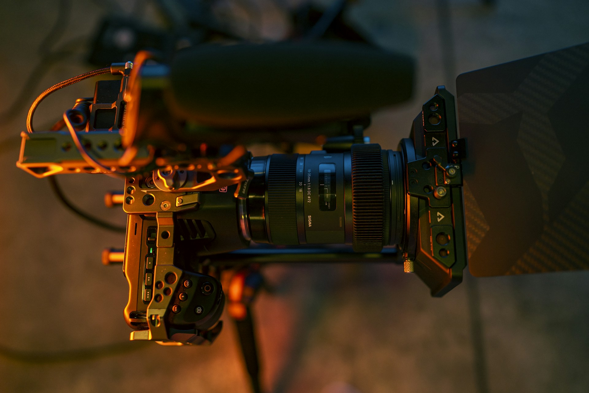 A close-up of professional video equipment in action during a documentary filming session led by lalavara.