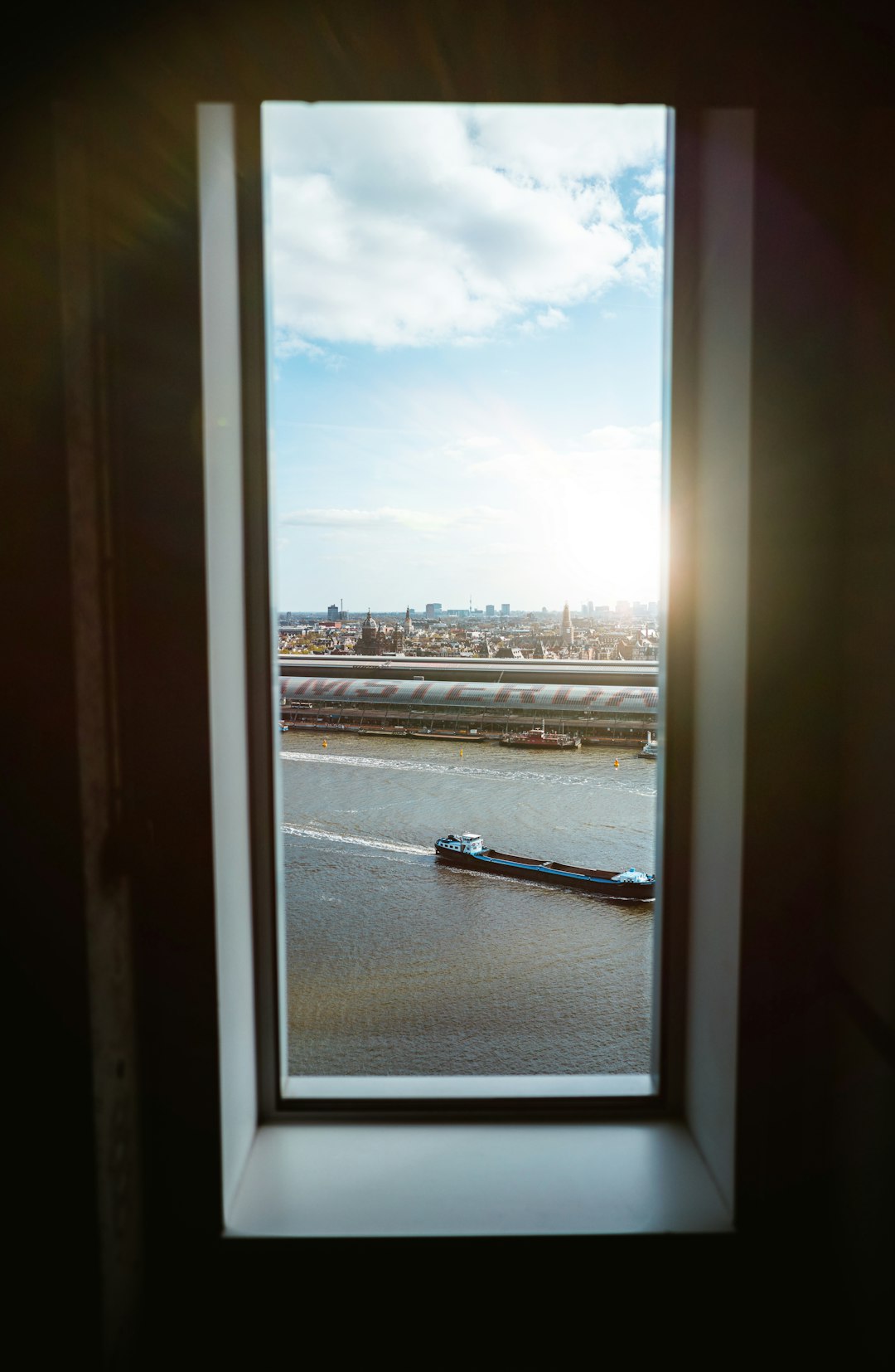 white wooden framed glass window