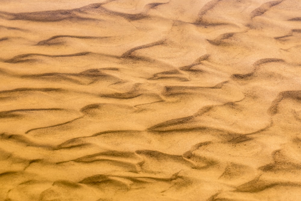 blue and white sand during daytime