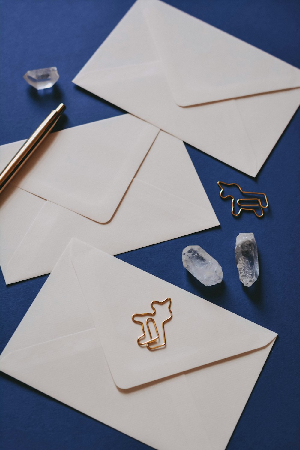 white printer paper with heart shaped and star shaped stones