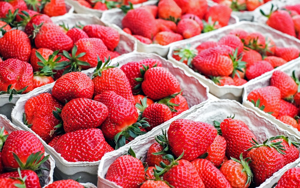 red strawberries on white plastic bags