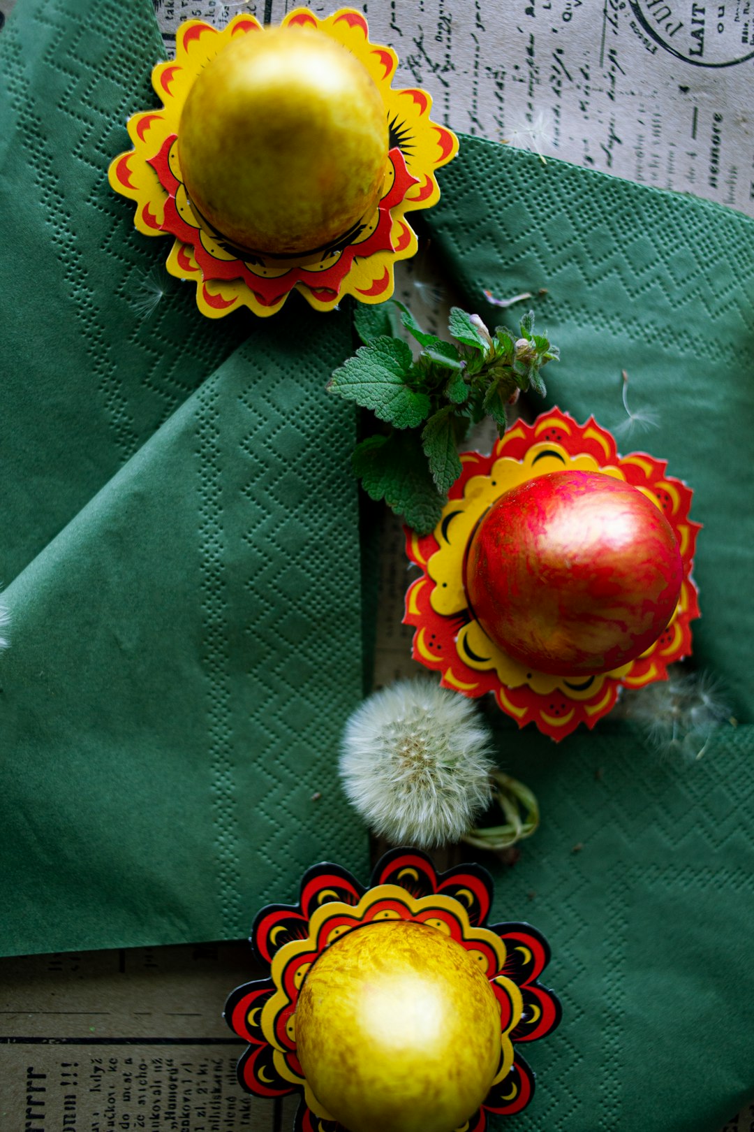red apple fruit on green textile