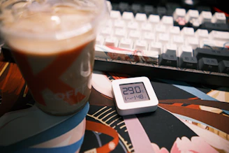 JL Marine humidifier next to a laptop and coffee cup, creating a comfortable workspace atmosphere.