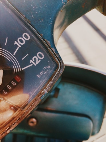 black and white analog speedometer
