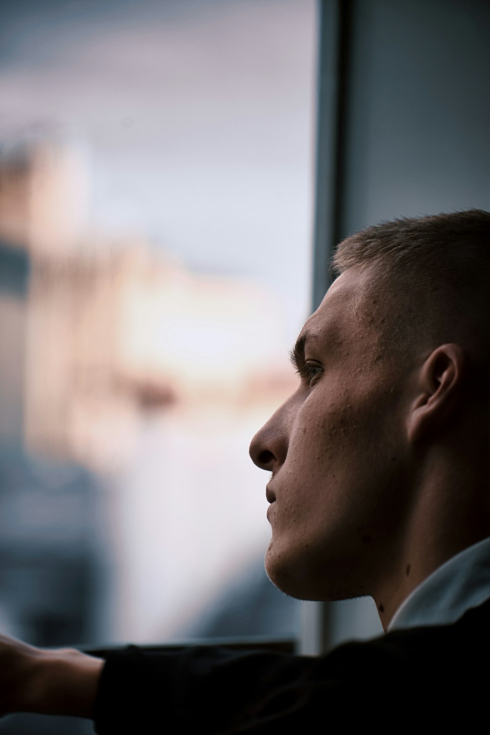 man in white collared shirt