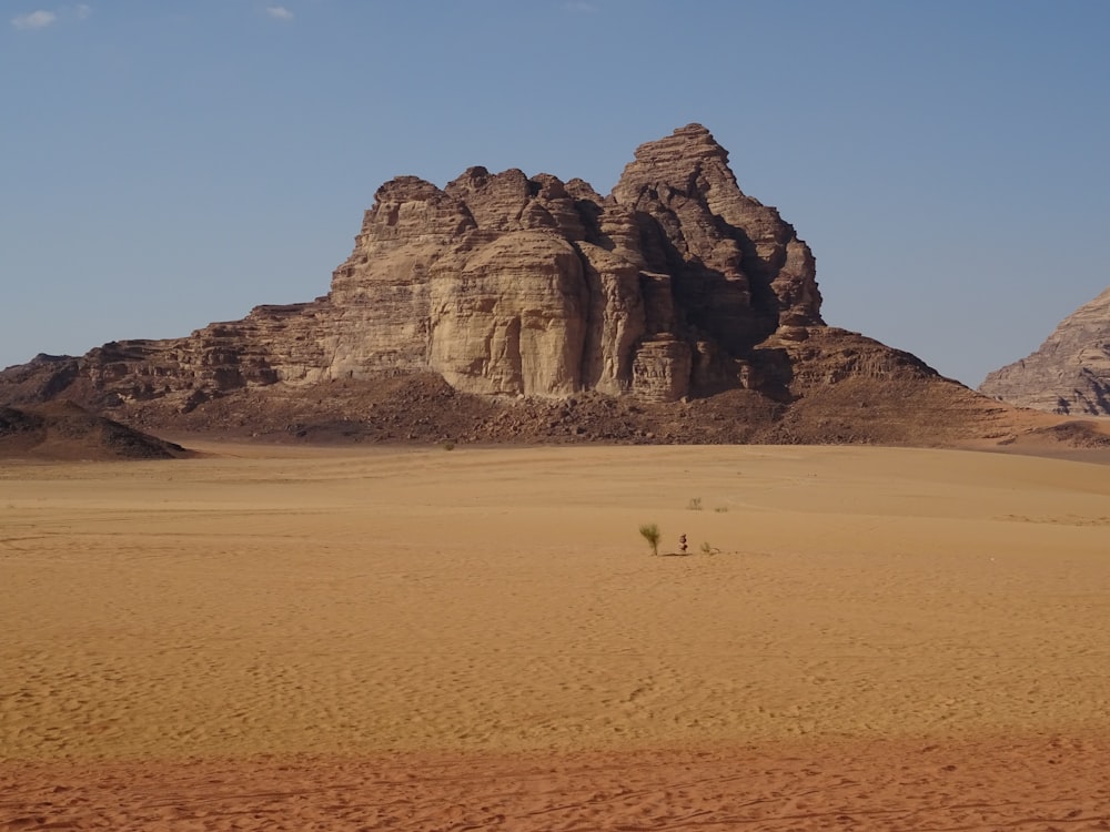 brown rock formation under blue sky during daytime