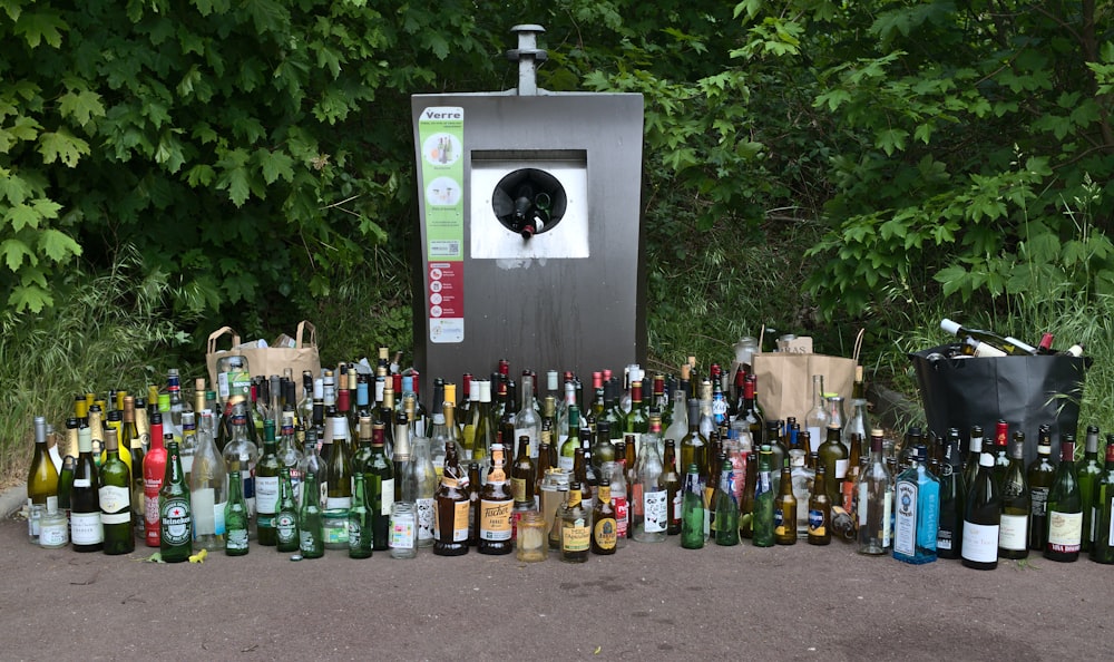 assorted bottles on gray shelf