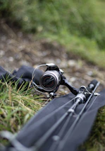 black dslr camera on green grass