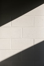 white concrete wall during daytime