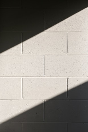 white concrete wall during daytime