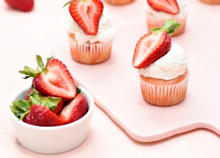 strawberry on white ceramic bowl