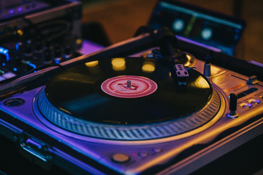 black and gray dj turntable